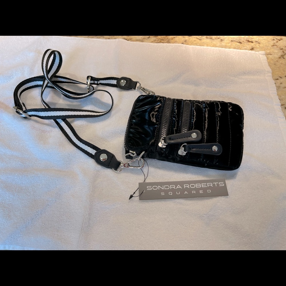 Brand new small black crossbody bag